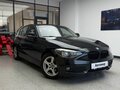 2012 BMW 1 серии 116i II (F20/F21), чёрный, 900000 рублей - вид 2