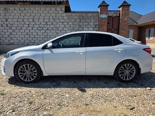 2013 Toyota Corolla XI (E160, E170, E180), белый, 1030000 рублей, вид 4