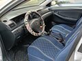 2003 Toyota Corolla IX (E120, E130), серебристый - вид 4