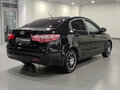 2013 Kia Rio 4-speed III, чёрный, 870000 рублей - вид 4