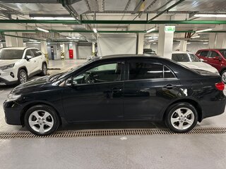 2010 Toyota Corolla X (E140, E150) Рестайлинг, чёрный, 800000 рублей, вид 2