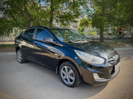 2011 Hyundai Solaris I, чёрный, 630000 рублей, вид 2