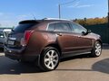 2014 Cadillac SRX II Рестайлинг, коричневый, 1600000 рублей - вид 1
