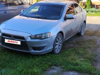 2010 Mitsubishi Lancer X, серебристый, 720000 рублей, вид 1