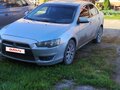 2010 Mitsubishi Lancer X, серебристый, 720000 рублей
