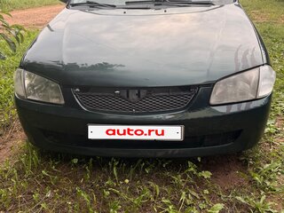 1999 Mazda Protege III (BJ), зелёный, 260000 рублей, вид 1
