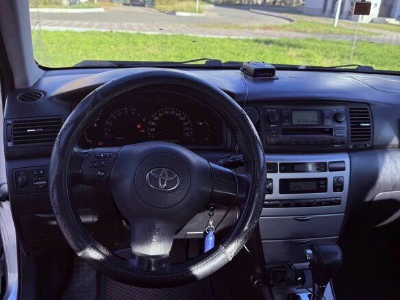2004 Toyota Corolla IX (E120, E130) Рестайлинг, голубой - вид 7