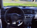 2004 Toyota Corolla IX (E120, E130) Рестайлинг, голубой - вид 7
