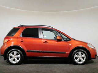 2010 Suzuki SX4 I (Classic) Рестайлинг, оранжевый, 800000 рублей, вид 4