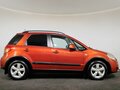2010 Suzuki SX4 I (Classic) Рестайлинг, оранжевый, 750000 рублей - вид 3