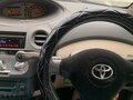 2003 Toyota Vitz I (P10), красный, 240000 рублей - вид 8