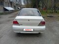 2001 Mitsubishi Lancer Cedia IX, белый, 150000 рублей - вид 1