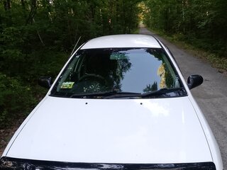 1999 Mazda Familia Y11, белый, 248000 рублей, вид 1