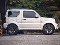 2018 Suzuki Jimny III Рестайлинг 2, белый - вид 3