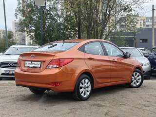 2016 Hyundai Solaris I Рестайлинг, оранжевый, 849000 рублей, вид 4