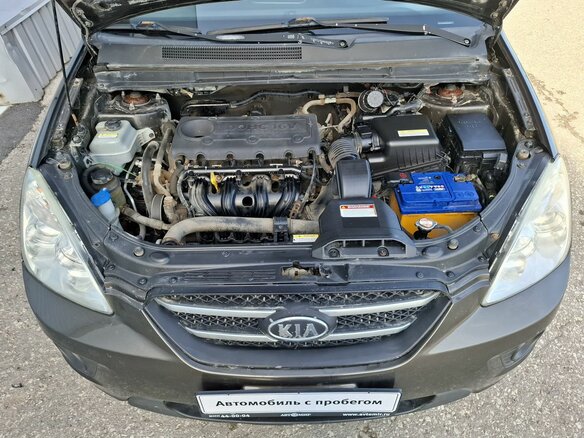 2010 Kia Carens II (UN), коричневый, 740000 рублей - вид 12