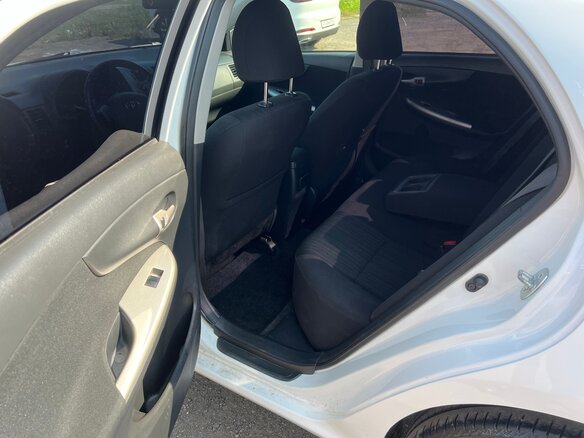2008 Toyota Corolla AMT X (E140, E150), белый - вид 11