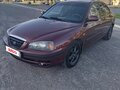 2010 Hyundai Elantra ТагАЗ III (XD2) Рестайлинг, красный