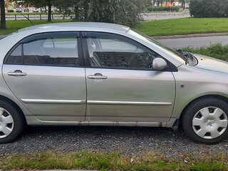 2004 Toyota Corolla IX (E120, E130) Рестайлинг, серебристый, 500000 рублей, вид 2