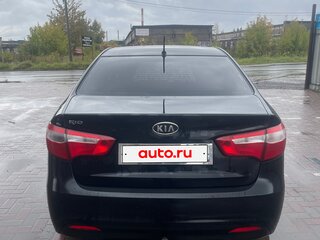 2012 Kia Rio 5-speed III, чёрный, 710000 рублей, вид 5