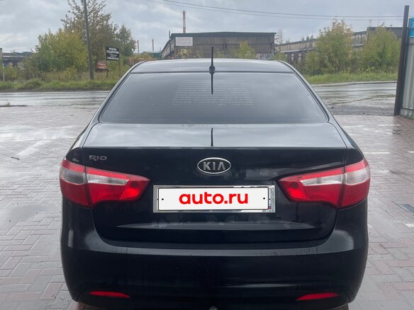 2012 Kia Rio 5-speed III, чёрный, 710000 рублей - вид 4