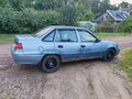 2012 Daewoo Nexia I Рестайлинг, серый, 111000 рублей - вид 2