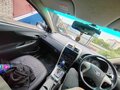2007 Toyota Corolla Axio X (E140, E150), белый, 570000 рублей - вид 8