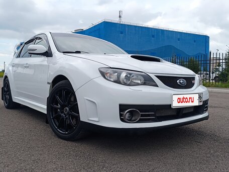 2009 Subaru Impreza WRX STi III, белый, 2300000 рублей, вид 2