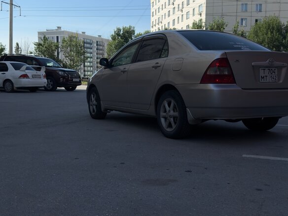 2000 Toyota Corolla IX (E120, E130), серебристый, 520000 рублей - вид 2