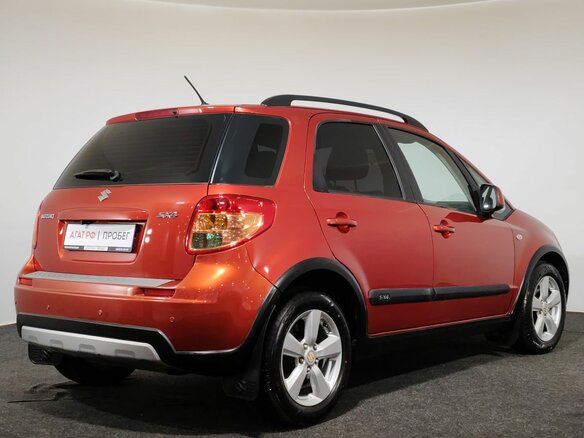2010 Suzuki SX4 I (Classic) Рестайлинг, оранжевый, 750000 рублей - вид 4
