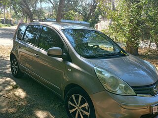 2010 Nissan Note I Рестайлинг, коричневый, 830000 рублей, вид 3