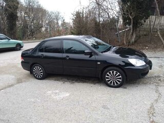 2007 Mitsubishi Lancer IX Рестайлинг, чёрный, 530000 рублей, вид 3