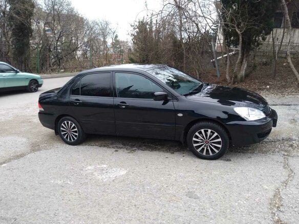 2007 Mitsubishi Lancer IX Рестайлинг, чёрный, 530000 рублей - вид 2