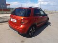 2013 Suzuki SX4 I (Classic) Рестайлинг, оранжевый, 1300000 рублей - вид 4