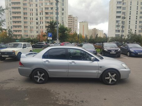 2009 Mitsubishi Lancer Classic IX Рестайлинг, серебристый, 650000 рублей, вид 3