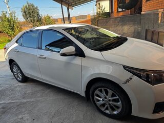 2016 Toyota Corolla XI (E160, E170, E180) Рестайлинг 1, белый, 1300000 рублей, вид 3