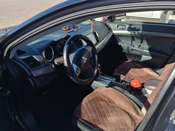 2012 Mitsubishi Lancer X Рестайлинг, чёрный, 980000 рублей - вид 4