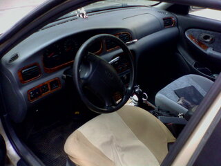 2001 Kia Clarus II, бежевый, 185000 рублей, вид 2