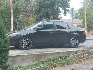 2011 Ford Focus II Рестайлинг, чёрный, 900000 рублей, вид 1