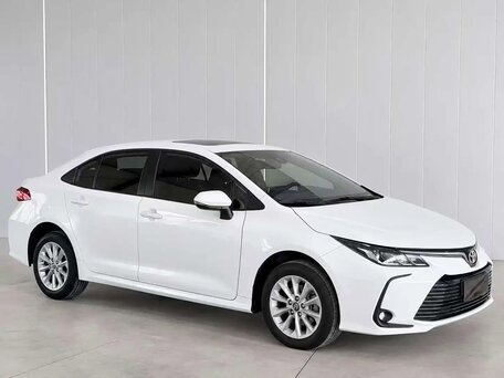 2022 Toyota Corolla XII (E210), белый, 1650000 рублей, вид 2