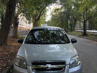2011 Chevrolet Aveo I Рестайлинг, серебристый, 350000 рублей, вид 2