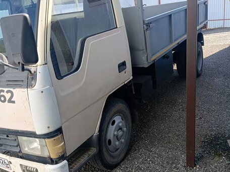 1993 Mitsubishi L-Series, бежевый, 1350000 рублей, вид 1