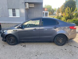 2014 Kia Rio 4-speed III, серый, 734000 рублей, вид 4