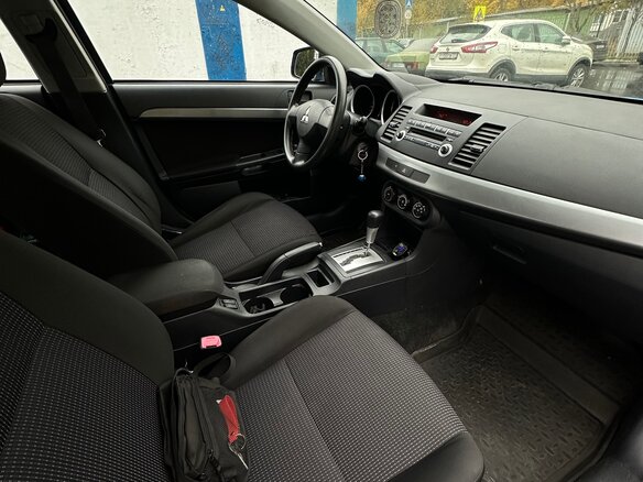 2010 Mitsubishi Lancer X, синий - вид 9