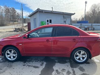 2010 Mitsubishi Lancer X, красный, 670000 рублей, вид 2