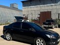 2010 Ford Focus II Рестайлинг, чёрный - вид 2