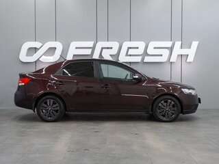 2010 Kia Cerato 5-speed II, красный, 699000 рублей, вид 5
