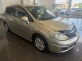 2010 Nissan Tiida I Рестайлинг, серебристый - вид 2