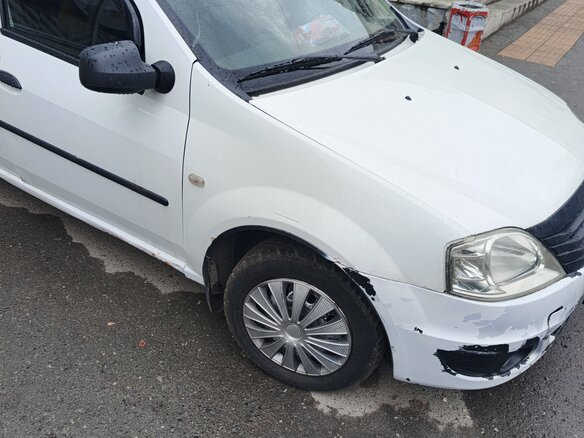 2010 Renault Logan I Рестайлинг, белый - вид 1