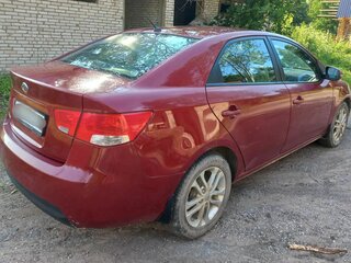 2011 Kia Cerato 6-speed II, красный, 530000 рублей, вид 5